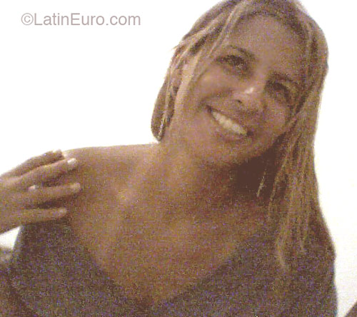 Date this happy Brazil girl Katia from  B2081